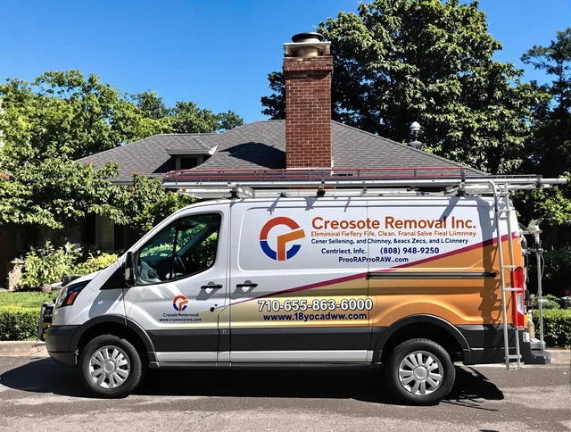 Fairhaven Chimney Sweep technician removing creosote safely in Fairhaven, MA